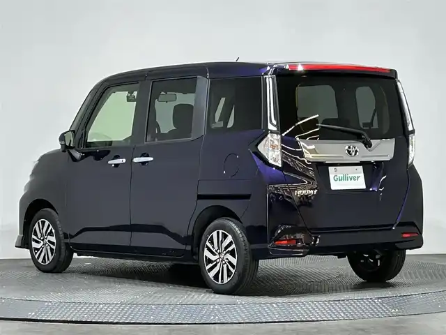 トヨタ ルーミー カスタムG 愛媛県 2023(令5)年 0.2万km クールバイオレットクリスタルシャイン ・９型ディスプレイオーディオ/（ＢＴ・フルセグＴＶ・ＦＭＡＭ・ＡｐｐｌｅＣａｒｐｌａｙ・ＡｎｄｒｏｉｄＡｕｔｏ・ＵＳＢ接続）/・全方位カメラ　/・前後ドライブレコーダー　/・レーダークルーズコントロール　/・両側パワースライドドア/・衝突軽減ブレーキ/・前後コーナーセンサー/・リヤドアサンシェード/・スペアキー
