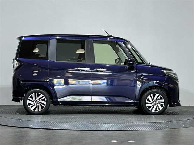 トヨタ ルーミー カスタムG 愛媛県 2023(令5)年 0.2万km クールバイオレットクリスタルシャイン ・９型ディスプレイオーディオ/（ＢＴ・フルセグＴＶ・ＦＭＡＭ・ＡｐｐｌｅＣａｒｐｌａｙ・ＡｎｄｒｏｉｄＡｕｔｏ・ＵＳＢ接続）/・全方位カメラ　/・前後ドライブレコーダー　/・レーダークルーズコントロール　/・両側パワースライドドア/・衝突軽減ブレーキ/・前後コーナーセンサー/・リヤドアサンシェード/・スペアキー