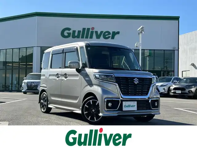 スズキ スペーシア カスタム HYBRID XS 愛媛県 2021(令3)年 2.1万km スチールシルバーM 登録時走行距離：20290Km/社外ディーラーOPメモリナビ/ワンセグTV/DVD/ETC/両側パワースライドドア/サンシェード/アイドリングストップ/横滑り防止装置/レーダークルーズコントロール/レーンキープアシスト/パーキングアシスト/衝突軽減システム/LEDヘッドライト/オートライト/エンジンスタートボタン/ベンチシート/シートヒーター/スマートキー/純正アルミホイール/純正フロアマット