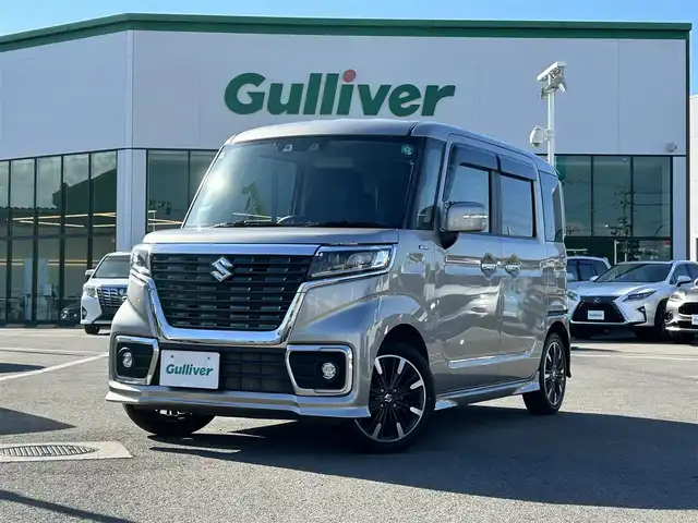 スズキ スペーシア カスタム HYBRID XS 愛媛県 2021(令3)年 2.1万km スチールシルバーM 登録時走行距離：20290Km/社外ディーラーOPメモリナビ/ワンセグTV/DVD/ETC/両側パワースライドドア/サンシェード/アイドリングストップ/横滑り防止装置/レーダークルーズコントロール/レーンキープアシスト/パーキングアシスト/衝突軽減システム/LEDヘッドライト/オートライト/エンジンスタートボタン/ベンチシート/シートヒーター/スマートキー/純正アルミホイール/純正フロアマット