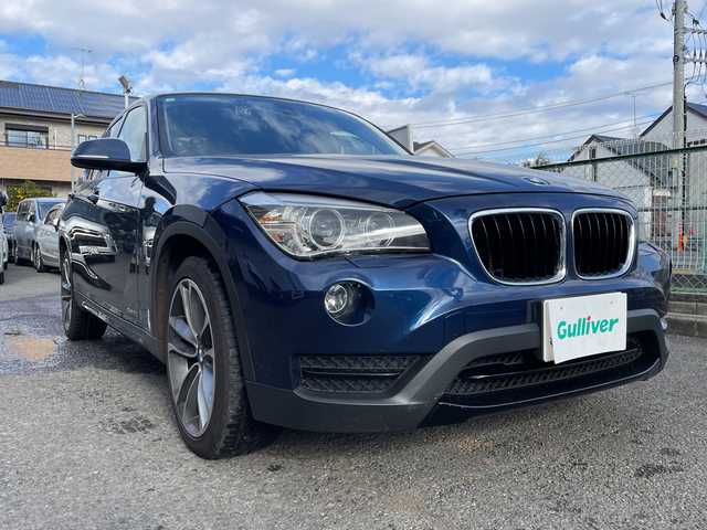ＢＭＷ Ｘ１ sDrive 20i スポーツ 神奈川県 2014(平26)年 6.5万km ディープシーブルー 純正HDDナビ/社外地デジTV/社外後席モニター/スマートキー　2本/プッシュスタート/ビルトインETC/HIDヘッドライト/前後フォグランプ/横滑り防止装置/アイドリングストップ/保証書/取扱説明書