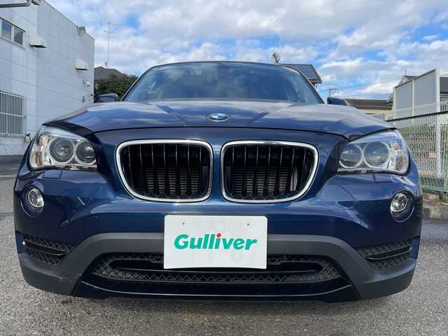 ＢＭＷ Ｘ１ sDrive 20i スポーツ 神奈川県 2014(平26)年 6.5万km ディープシーブルー 純正HDDナビ/社外地デジTV/社外後席モニター/スマートキー　2本/プッシュスタート/ビルトインETC/HIDヘッドライト/前後フォグランプ/横滑り防止装置/アイドリングストップ/保証書/取扱説明書