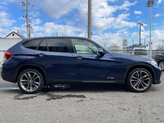 ＢＭＷ Ｘ１ sDrive 20i スポーツ 神奈川県 2014(平26)年 6.5万km ディープシーブルー 純正HDDナビ/社外地デジTV/社外後席モニター/スマートキー　2本/プッシュスタート/ビルトインETC/HIDヘッドライト/前後フォグランプ/横滑り防止装置/アイドリングストップ/保証書/取扱説明書