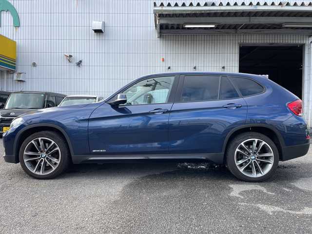 ＢＭＷ Ｘ１ sDrive 20i スポーツ 神奈川県 2014(平26)年 6.5万km ディープシーブルー 純正HDDナビ/社外地デジTV/社外後席モニター/スマートキー　2本/プッシュスタート/ビルトインETC/HIDヘッドライト/前後フォグランプ/横滑り防止装置/アイドリングストップ/保証書/取扱説明書