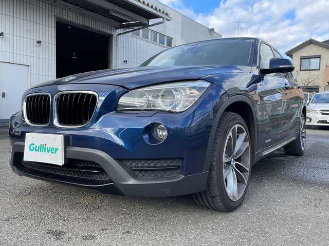 ＢＭＷ Ｘ１ sDrive 20i スポーツ 神奈川県 2014(平26)年 6.5万km ディープシーブルー 純正HDDナビ/社外地デジTV/社外後席モニター/スマートキー　2本/プッシュスタート/ビルトインETC/HIDヘッドライト/前後フォグランプ/横滑り防止装置/アイドリングストップ/保証書/取扱説明書