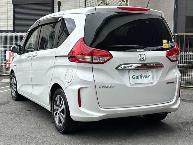 ホンダ フリード ハイブリット G ホンダセンシング 茨城県 2020(令2)年 6.7万km プラチナホワイトパール 純正ナビ/(Gathers/VXM-207VFNi)/フルセグＴＶ　ＢＴ　ＣＤ／ＤＶＤ　/純正フリップダウンモニター/前席シートヒーター　/ホンダセンシング　/レーンキープアシスト/コーナーセンサー/クルーズコントロール/オートドアミラー/アクティブコーナリングライト/LEDヘッドライト/プラズマクラスター/両側パワスラ　/バックカメラ/３列シート　/チップアップシート　　/ビルトインＥＴＣ/保証書/取扱説明書/点検記録簿