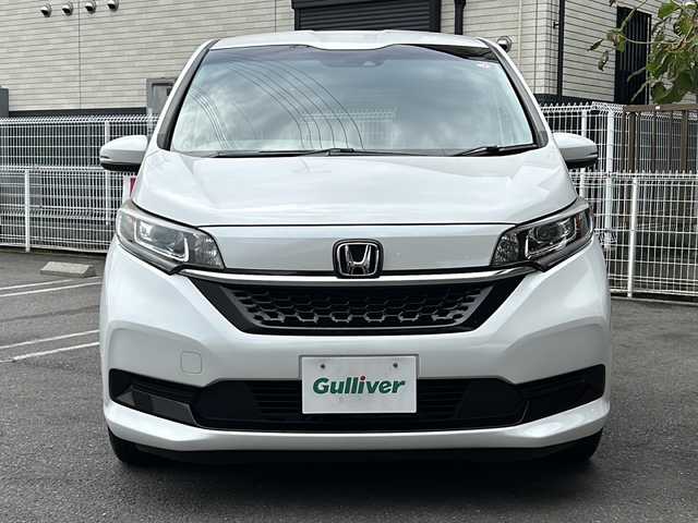 ホンダ フリード ハイブリット G ホンダセンシング 茨城県 2020(令2)年 6.7万km プラチナホワイトパール 純正ナビ/(Gathers/VXM-207VFNi)/フルセグＴＶ　ＢＴ　ＣＤ／ＤＶＤ　/純正フリップダウンモニター/前席シートヒーター　/ホンダセンシング　/レーンキープアシスト/コーナーセンサー/クルーズコントロール/オートドアミラー/アクティブコーナリングライト/LEDヘッドライト/プラズマクラスター/両側パワスラ　/バックカメラ/３列シート　/チップアップシート　　/ビルトインＥＴＣ/保証書/取扱説明書/点検記録簿