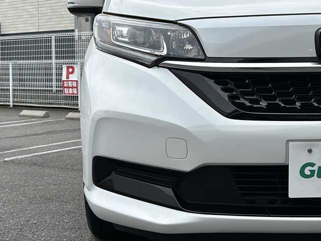 ホンダ フリード ハイブリット G ホンダセンシング 茨城県 2020(令2)年 6.7万km プラチナホワイトパール 純正ナビ/(Gathers/VXM-207VFNi)/フルセグＴＶ　ＢＴ　ＣＤ／ＤＶＤ　/純正フリップダウンモニター/前席シートヒーター　/ホンダセンシング　/レーンキープアシスト/コーナーセンサー/クルーズコントロール/オートドアミラー/アクティブコーナリングライト/LEDヘッドライト/プラズマクラスター/両側パワスラ　/バックカメラ/３列シート　/チップアップシート　　/ビルトインＥＴＣ/保証書/取扱説明書/点検記録簿