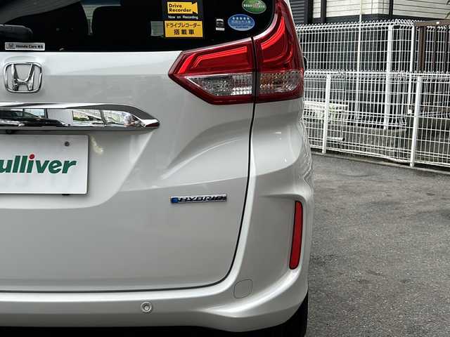 ホンダ フリード ハイブリット G ホンダセンシング 茨城県 2020(令2)年 6.7万km プラチナホワイトパール 純正ナビ/(Gathers/VXM-207VFNi)/フルセグＴＶ　ＢＴ　ＣＤ／ＤＶＤ　/純正フリップダウンモニター/前席シートヒーター　/ホンダセンシング　/レーンキープアシスト/コーナーセンサー/クルーズコントロール/オートドアミラー/アクティブコーナリングライト/LEDヘッドライト/プラズマクラスター/両側パワスラ　/バックカメラ/３列シート　/チップアップシート　　/ビルトインＥＴＣ/保証書/取扱説明書/点検記録簿