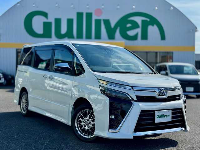 トヨタ ヴォクシー ハイブリッド ZS 煌Ⅲ 滋賀県 2021(令3)年 3.7万km ホワイトパールクリスタルシャイン ワンオーナー/アルパインBIGX/　フルセグ Bluetooth CD DVD AM FM/バックカメラ/コーナーカメラ/トップカメラ/アルパインフリップダウンモニター/ドライブレコーダー前後/ETC/Toyota Safety Sense/プリクラッシュセーフティ/（歩行者［昼］検知機能付衝突回避支援タイプ/　レーザーレーダー＋単眼カメラ方式）/レーンディパーチャーアラート/オートマチックハイビーム/先行車発進告知機能/クリアランスソナー/Bi-Beam LEDヘッドランプ/（オートレベリング機能付 ブラックエクステンション加飾）　　　　 /  ＋LEDクリアランスランプ/LEDフロントフォグランプ/両側パワースライドドア/純正16インチアルミ/スマートキー×2/プッシュスタート/