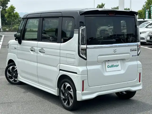 スズキ スペーシア カスタム HYBRID XS 奈良県 2024(令6)年 0.4万km ピュアホワイトパール/ブラック2トーン 両側パワースライドドア/純正ナビ(フルセグTV/AM・FM/BT/AppleCarPlay/AndroidAuto)/アラウンドビューモニター/ETC/ヘッドアップディスプレイ/シートヒーター(D/N席)/ステアリングヒーター/LEDヘッドライト/フォグランプ/後席サンシェード/純正15インチアルミホイール/純正フロアマット