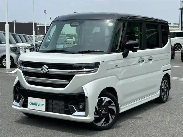 スズキ スペーシア カスタム HYBRID XS 奈良県 2024(令6)年 0.4万km ピュアホワイトパール/ブラック2トーン 両側パワースライドドア/純正ナビ(フルセグTV/AM・FM/BT/AppleCarPlay/AndroidAuto)/アラウンドビューモニター/ETC/ヘッドアップディスプレイ/シートヒーター(D/N席)/ステアリングヒーター/LEDヘッドライト/フォグランプ/後席サンシェード/純正15インチアルミホイール/純正フロアマット