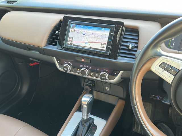 ホンダ フィット e:HEVリュクス 福島県 2020(令2)年 5万km プレミアムグラマラスブロンズP ハーフレザーシート/純正ナビ/衝突軽減ブレーキ/クルーズコントロール/レーンキープアシスト/ＥＴＣ/純正16inアルミホイール/オートライト/ＬＥＤライト/ウィンカーミラー/電動格納ミラー/スマートキー/プッシュスタート/Ｗ＋サイドエアバッグ/横滑り防止装置/ＡＢＳ/ドアバイザー/純正フロアマット/取扱説明書