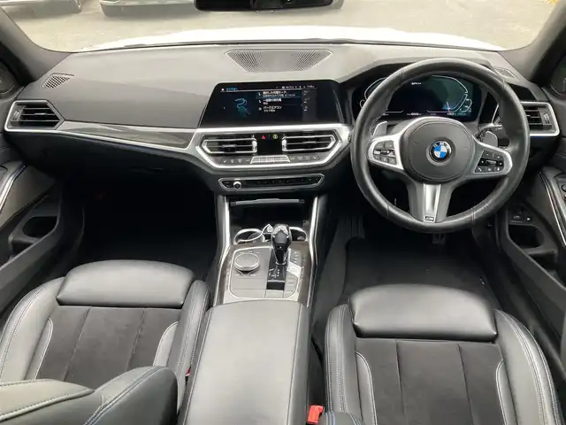 ＢＭＷ ３３０ｅ Mスポーツ 福岡県 2020(令2)年 6.4万km パール ワンオーナー/ハーマンカードンサウンドシステム/純正ナビ（BT/フルセグ/Spotify/AM/FM)/アラウンドビューモニター/Bカメラ/フロントカメラ/サイドカメラ/レーダークルーズコントロール/LEDヘッドライト/オートマチックハイビーム/オートライト/ハーフレザーシート/DN席パワーシート/DN席シートヒーター/純正19インチAW/ワイヤレス充電/ドライブレコーダー/ISOFIX/AutoHold/ステアリングスイッチ/ステアリングアシスト/パーキングアシスト/横滑り防止装置/コーナーセンサー/レーンキープアシスト/盗難防止装置/衝突被害軽減システム/保証書/取扱説明書/スマートキー/ETC