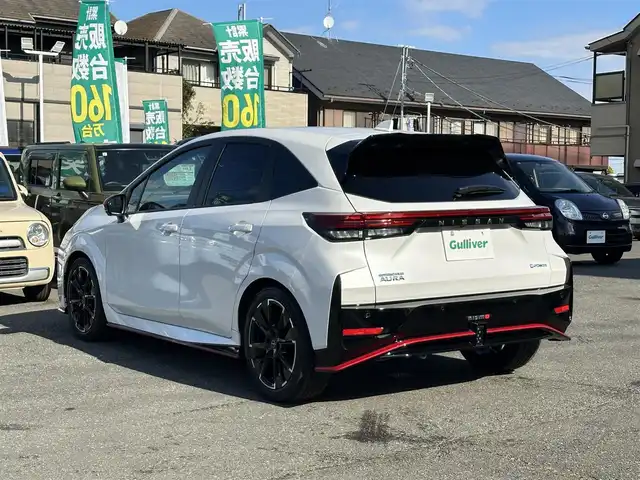 日産 オーラ ニスモ 東京都 2023(令5)年 2.1万km ピュアホワイトパール ワンオーナー/HDDナビ/フルセグテレビ/バックカメラ/クルーズコントロール/プッシュスタート/ETC/ドライブレコーダー/取扱説明書/保証書/タイヤバリ溝/低走行