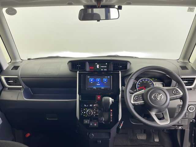 トヨタ ルーミー カスタムG 秋田県 2024(令6)年 0.6万km ブラックマイカメタリック ４ＷＤ/社外ナビ/　(AM/AM/Bluetooth)/バックカメラ/レーダークルーズコントロール/両側パワースライドドア/ウェルカムオープン/オートブレーキホールド/オートライト/LEDヘッドライト/スマートキー/スペアキー/純正フロアマット/ETC/取扱説明書/保証書