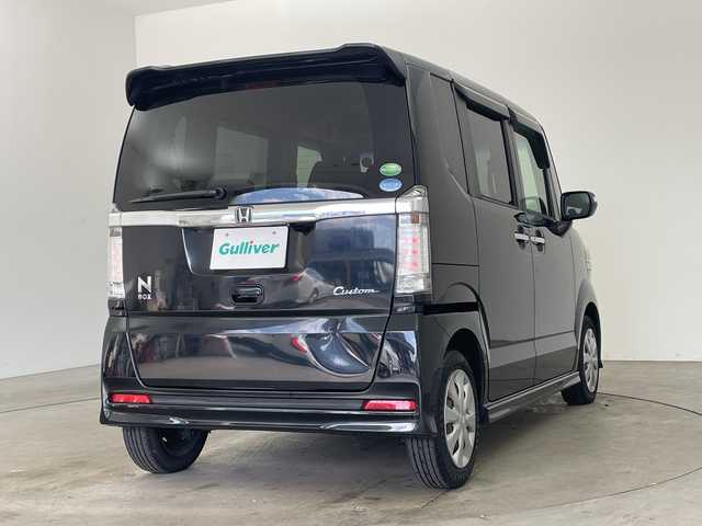 ホンダ Ｎ ＢＯＸ カスタム G 兵庫県 2014(平26)年 8.4万km スマートブラック ・社外SDナビ/・バックカメラ/・CD・AM・FM・TV/・片側パワースライドドア/・横滑り防止装置/・アイドリングストップ/・ETC/・ECON/・ドアバイザー/・ステアリングスイッチ/・純正フロアマット/・スマートキー/・HIDヘッドライト/・フォグランプ/・プッシュスタート/・取扱説明書/・保証書