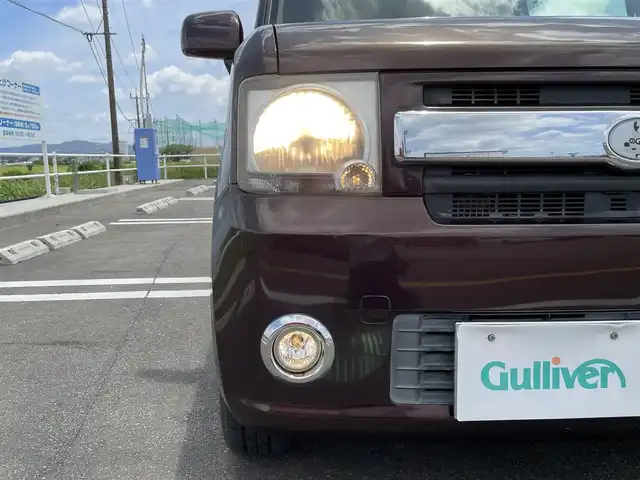 ダイハツ ムーヴ コンテ X 佐賀県 2011(平23)年 10.9万km プラムブラウンクリスタルマイカ SDナビゲーション/・AM/FM/Bluetooth/CD/DVD/TV//革巻きステアリング/スマートキー/車内LEDフットランプ/アイドリングストップ/オートエアコン/ETC/純正フロアマット/純正ドアバイザー/新車保証書/取扱説明書/スペアキーなし