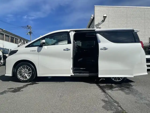 トヨタ アルファードハイブリット SR 青森県 2019(令1)年 3.9万km ホワイトパールクリスタルシャイン 寒冷地仕様/サンルーフ/ワンオーナー/ＢＳＭ／デジタルインナーミラー/３眼ＬＥＤヘッドライト/純正ＳＤナビフルセグ（ＮＳＺＮ－Ｚ６８Ｔ）/フリップダウンモニター（Ｖ１２Ｔ－Ｒ６８Ｃ）/パワーバックドア/純正エンスタ（スマートキー一体タイプ）/スマートキー/スペアキー/セーフティセンス/運転席助手席電動シート/新車時保証書/取扱説明書