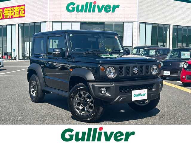 スズキ ジムニー シエラ JC 鳥取県 2024(令6)年 1.1万km ブルーイッシュブラックパール3 ワンオーナー/社外ディスプレイオーディオ/DVD/CD/BT/バックカメラ/前後ドライブレコーダー/前席シートヒーター/クルーズコントロール/レーンキープアシスト/LEDヘットライト/純正15インチアルミホイール/背面タイヤ/プッシュエンジンスタート/アイドリングストップ/フロアマット/保証書/スペアキー