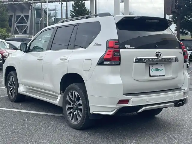 トヨタ ランドクルーザー プラド TX Lパッケージ 千葉県 2022(令4)年 4万km ホワイトパールクリスタルシャイン ワンオーナー/モデリスタフロントエアロ/モデリスタリアエアロ/モデリスタリアスポイラー/モデリスタマフラー/純正19インチアルミホイール/純正9インチナビ/クルーズコントロール/パワーバックドア/プッシュスタート/センターデフロック /ダウンヒルアシスト機能/オートハイビーム/ETC2.0/ヘッドライトウォッシャー/アイドルアップ（寒冷地仕様）/ヒルスタートアシスト/2nd START（雪道・泥道向け）/切替４WD/ドアバイザー/電動格納ミラー/ウィンカーミラー/保証書/取扱説明書、ナビ説明書