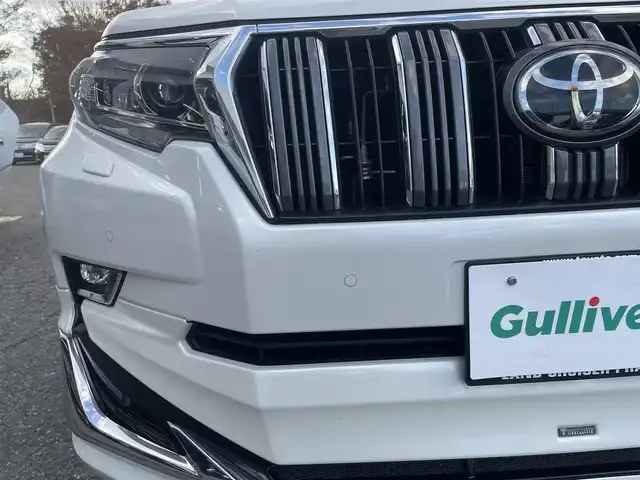 トヨタ ランドクルーザー プラド TX Lパッケージ 千葉県 2022(令4)年 4万km ホワイトパールクリスタルシャイン ワンオーナー/モデリスタフロントエアロ/モデリスタリアエアロ/モデリスタリアスポイラー/モデリスタマフラー/純正19インチアルミホイール/純正9インチナビ/クルーズコントロール/パワーバックドア/プッシュスタート/センターデフロック /ダウンヒルアシスト機能/オートハイビーム/ETC2.0/ヘッドライトウォッシャー/アイドルアップ（寒冷地仕様）/ヒルスタートアシスト/2nd START（雪道・泥道向け）/切替４WD/ドアバイザー/電動格納ミラー/ウィンカーミラー/保証書/取扱説明書、ナビ説明書