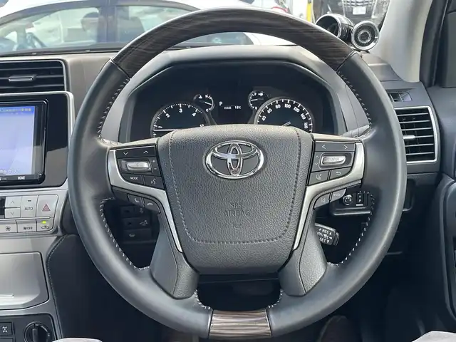 トヨタ ランドクルーザー プラド TX Lパッケージ 千葉県 2022(令4)年 4万km ホワイトパールクリスタルシャイン ワンオーナー/モデリスタフロントエアロ/モデリスタリアエアロ/モデリスタリアスポイラー/モデリスタマフラー/純正19インチアルミホイール/純正9インチナビ/クルーズコントロール/パワーバックドア/プッシュスタート/センターデフロック /ダウンヒルアシスト機能/オートハイビーム/ETC2.0/ヘッドライトウォッシャー/アイドルアップ（寒冷地仕様）/ヒルスタートアシスト/2nd START（雪道・泥道向け）/切替４WD/ドアバイザー/電動格納ミラー/ウィンカーミラー/保証書/取扱説明書、ナビ説明書