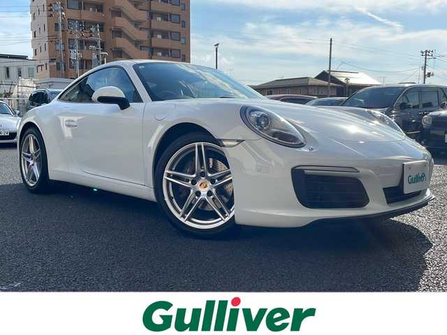 ポルシェ ９１１ カレラ 山形県 2019(令1)年 2.7万km ピュアホワイト 水平対向３Ｌ６気筒ツインターボ／３７０ｐｓ/７速ＰＤＫ/パドルシフト/黒本革シート（ヒーター付きパワーシート）　/純正１９インチＡＷ　/電動可変リアスポイラー/純正ナビ/バックカメラ/アダプティブクルーズコントロール/H.I.D./前後クリアランスソナー/前方ドライブレコーダー/ETC２．０/保証書/取扱説明書/スペアキーx1