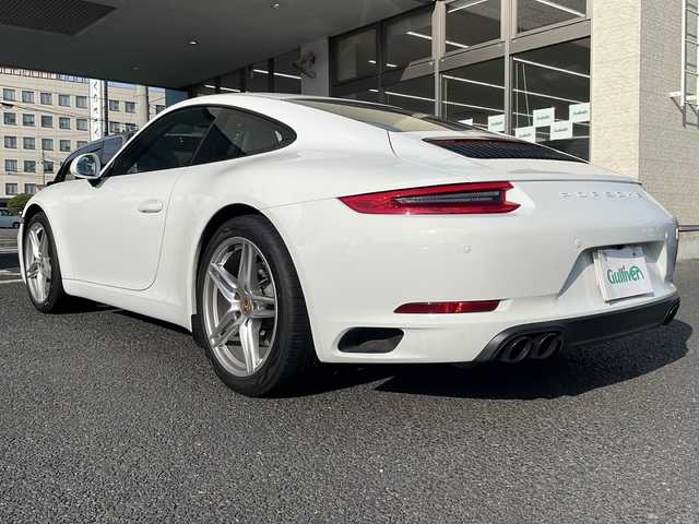 ポルシェ ９１１ カレラ 山形県 2019(令1)年 2.7万km ピュアホワイト 水平対向３Ｌ６気筒ツインターボ／３７０ｐｓ/７速ＰＤＫ/パドルシフト/黒本革シート（ヒーター付きパワーシート）　/純正１９インチＡＷ　/電動可変リアスポイラー/純正ナビ/バックカメラ/アダプティブクルーズコントロール/H.I.D./前後クリアランスソナー/前方ドライブレコーダー/ETC２．０/保証書/取扱説明書/スペアキーx1