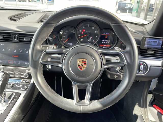 ポルシェ ９１１ カレラ 山形県 2019(令1)年 2.7万km ピュアホワイト 水平対向３Ｌ６気筒ツインターボ／３７０ｐｓ/７速ＰＤＫ/パドルシフト/黒本革シート（ヒーター付きパワーシート）　/純正１９インチＡＷ　/電動可変リアスポイラー/純正ナビ/バックカメラ/アダプティブクルーズコントロール/H.I.D./前後クリアランスソナー/前方ドライブレコーダー/ETC２．０/保証書/取扱説明書/スペアキーx1