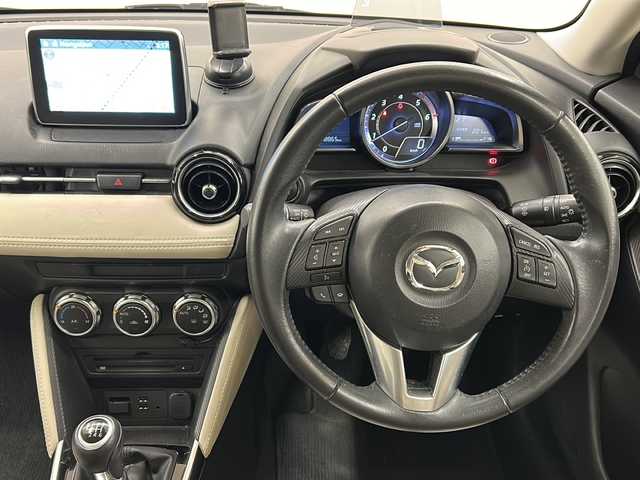 マツダ デミオ XD ツーリング Lパッケージ 道央・札幌 2015(平27)年 13.9万km チタニウムフラッシュマイカ /6速MT//純正ナビ//Bluetooth//フルセグTV//CD/DVD再生可//バックカメラ//ステアリングスイッチ//クルーズコントロール//ハーフレザーシート//衝突軽減ブレーキ//ブラインドスポットモニター//レーンキープアシスト//アイドリングストップ//LEDライト//フォグランプ//ETC//プッシュスタート//USB端子//ヘッドアップディスプレイ//純正フロアマット//社外WORK17インチアルミホイール