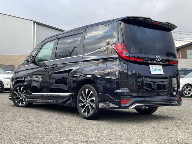 トヨタ ノア ハイブリッド S－Z 宮城県 2024(令6)年 3.5万km スパークリングブラックパールクリスタルシャイン ワンオーナー/快適利便パッケージ/モデリスタフルエアロ/純正ナビ/ＣＤ／ＤＶＤ／ＦＭ／ＡＭ／Ｂｌｕｅｔｏｏｔｈ／ＵＳＢ/Ｍｉｒａｃａｓｔ/レーダークルーズコントロール/ブラインドスポットモニター/ヘッドアップディスプレイ/ブレーキホールド/横滑り防止装置/オートハイビーム/ハンドルヒーター/nanoe-X/デジタルインナーミラー/純正フリップダウンモニター/純正ドラレコ前後/純正フロアマット/前席シートヒーター/パワーバックドア/ETC2.0