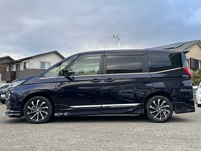 トヨタ ノア ハイブリッド S－Z 宮城県 2024(令6)年 3.5万km スパークリングブラックパールクリスタルシャイン ワンオーナー/快適利便パッケージ/モデリスタフルエアロ/純正ナビ/ＣＤ／ＤＶＤ／ＦＭ／ＡＭ／Ｂｌｕｅｔｏｏｔｈ／ＵＳＢ/Ｍｉｒａｃａｓｔ/レーダークルーズコントロール/ブラインドスポットモニター/ヘッドアップディスプレイ/ブレーキホールド/横滑り防止装置/オートハイビーム/ハンドルヒーター/nanoe-X/デジタルインナーミラー/純正フリップダウンモニター/純正ドラレコ前後/純正フロアマット/前席シートヒーター/パワーバックドア/ETC2.0