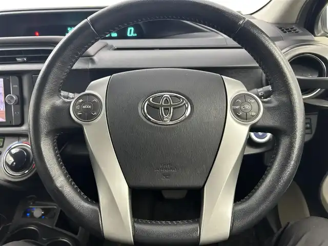 トヨタ アクア G 千葉県 2012(平24)年 10.6万km グレーメタリック 純正７型ナビ（NSZT-W62G）/（AM＆FM＆Bluetooth＆フルセグTV＆CD＆DVD/ＥＴＣ　/エアロパーツ（F・S・R）/禁煙（前オーナー申告）　/ＨＩＤヘッドライト（オートライト付き）/フォグランプ　/電動格納サイドミラー　/１２Ｖシガーソケット　/ステアリングスイッチ　/バックカメラ　/ドアバイザー　/ＥＶモード/ヘッドライトレベライザー/ISOFIX/ECOモード/アイドリングストップ/プッシュスタート/ウィンカーミラー
