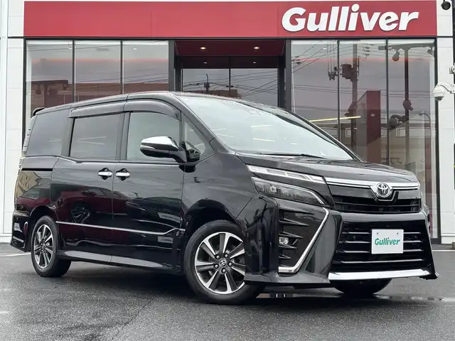 トヨタ ヴォクシー ZS 煌Ⅱ 宮城県 2020(令2)年 9.8万km ブラック 登録時走行距離97481km/純正ナビ/フルセグＴＶ/ＣＤ／ＤＶＤ／Ｂｌｕｅｔｏｏｔｈ/後席モニター/クルーズコントロール/デュアルエアコン/両側パワースライド/スペアキー/ドアバイザー/エアロパーツ/ETC/スマートキー/電動格納ミラー/バックカメラ/コーナーセンサー/純正アルミホイール/純正フロアマット/LEDライト