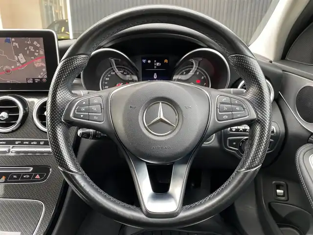 メルセデス・ベンツ Ｃ１８０ アバンギャルド 福岡県 2015(平27)年 7.4万km オブシディアンブラック 純正ナビ/CD/DVD/TV/Bカメラ/ACC/レーンキープ/ブラインドスポット/黒半革シート/パワーシート/シートヒーター/アンビエントライト/ステアリングアシスト/ETC/LEDヘッドライト/オートライト/取扱説明書/保証書/スマートキー