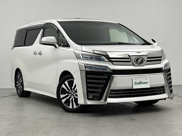 トヨタ ヴェルファイア Z Gエディション 三重県 2018(平30)年 5.7万km ホワイトパールクリスタルシャイン ツインムーンルーフ/トヨタセーフティセンス/・プリクラッシュセーフティ/・レーンディパーチャーアラート/・オートマチックハイビーム/・ロードサインアシスト/・先行車発進告知/レーダークルーズコントロール/クリアランスソナー/両側パワースライドドア/アルパインナビ１１型BIGX：EX11Z/・フルセグ/CD/DVD/SD/Bluetooth/バックカメラ/革巻きステアリング/ステアリングスイッチ/ステアリングヒーター/パワーバックドア/合皮シート/シートヒーター/ベンチレーション/パワーシート/オットマン/LEDヘッドライト/フォグランプ/前後ドライブレコーダー（ZDR-015）/ETC/純正18インチアルミホイール/W+サイド+カーテンエアバック