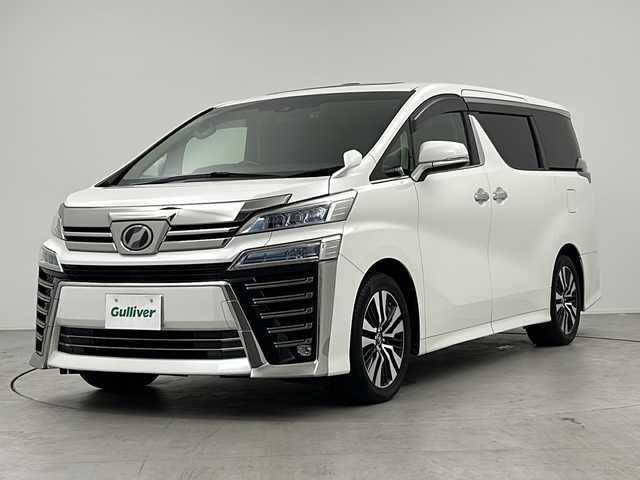 トヨタ ヴェルファイア Z Gエディション 三重県 2018(平30)年 5.7万km ホワイトパールクリスタルシャイン ツインムーンルーフ/トヨタセーフティセンス/・プリクラッシュセーフティ/・レーンディパーチャーアラート/・オートマチックハイビーム/・ロードサインアシスト/・先行車発進告知/レーダークルーズコントロール/クリアランスソナー/両側パワースライドドア/アルパインナビ１１型BIGX：EX11Z/・フルセグ/CD/DVD/SD/Bluetooth/バックカメラ/革巻きステアリング/ステアリングスイッチ/ステアリングヒーター/パワーバックドア/合皮シート/シートヒーター/ベンチレーション/パワーシート/オットマン/LEDヘッドライト/フォグランプ/前後ドライブレコーダー（ZDR-015）/ETC/純正18インチアルミホイール/W+サイド+カーテンエアバック