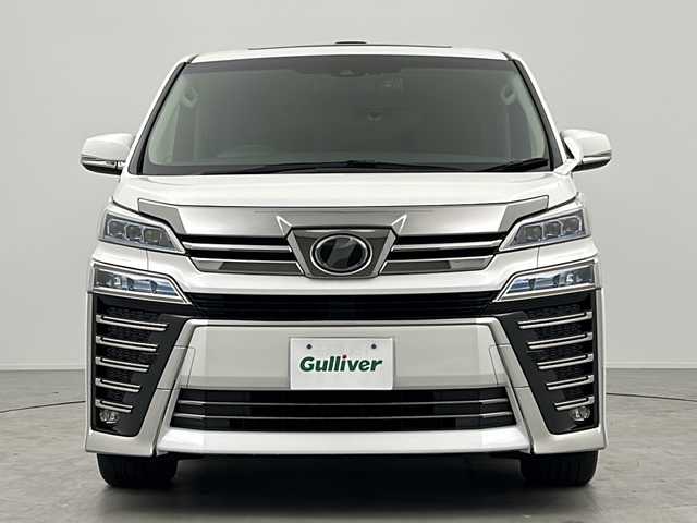トヨタ ヴェルファイア Z Gエディション 三重県 2018(平30)年 5.7万km ホワイトパールクリスタルシャイン ツインムーンルーフ/トヨタセーフティセンス/・プリクラッシュセーフティ/・レーンディパーチャーアラート/・オートマチックハイビーム/・ロードサインアシスト/・先行車発進告知/レーダークルーズコントロール/クリアランスソナー/両側パワースライドドア/アルパインナビ１１型BIGX：EX11Z/・フルセグ/CD/DVD/SD/Bluetooth/バックカメラ/革巻きステアリング/ステアリングスイッチ/ステアリングヒーター/パワーバックドア/合皮シート/シートヒーター/ベンチレーション/パワーシート/オットマン/LEDヘッドライト/フォグランプ/前後ドライブレコーダー（ZDR-015）/ETC/純正18インチアルミホイール/W+サイド+カーテンエアバック