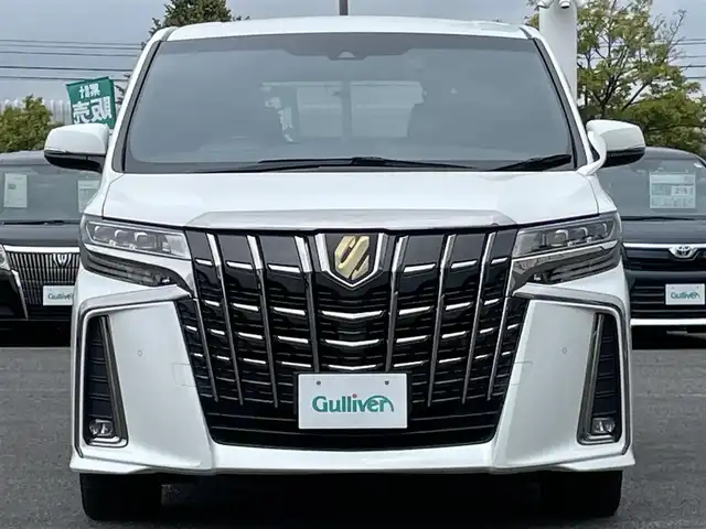 トヨタ アルファード S タイプゴールド 道央・札幌 2021(令3)年 7.2万km ホワイトパールクリスタルシャイン ４WD/純正メーカーナビ/CD/DVD/BT/フルセグ/純正フリップダウンモニター/トヨタセーフティセンス/プリクラッシュセーフティ/横滑り防止装置/レーダークルーズコントロール/レーンキープアシスト/クリアランスソナー/パーキングサポートブレーキ/ロードサインアシスト/バックカメラ/ビルトインETC/ドライブレコーダー/アイドリングストップ/ECOMODE/両側パワースライドドア/パワーバックドア/ハーフレザーシート/2列目オットマン/革巻きウッドコンビステアリング/ステアリングリモコン/電動パーキング/ブレーキホールド/MTモード付AT/プッシュスタート/スマートキー/LEDヘッドライト/オートライト/オートハイビーム/フォグランプ/電動格納ミラー/ウィンカーミラー/純正フロアマット/ドアバイザー/スペアキー