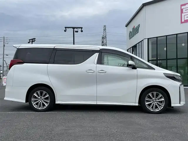 トヨタ アルファード S タイプゴールド 道央・札幌 2021(令3)年 7.2万km ホワイトパールクリスタルシャイン ４WD/純正メーカーナビ/CD/DVD/BT/フルセグ/純正フリップダウンモニター/トヨタセーフティセンス/プリクラッシュセーフティ/横滑り防止装置/レーダークルーズコントロール/レーンキープアシスト/クリアランスソナー/パーキングサポートブレーキ/ロードサインアシスト/バックカメラ/ビルトインETC/ドライブレコーダー/アイドリングストップ/ECOMODE/両側パワースライドドア/パワーバックドア/ハーフレザーシート/2列目オットマン/革巻きウッドコンビステアリング/ステアリングリモコン/電動パーキング/ブレーキホールド/MTモード付AT/プッシュスタート/スマートキー/LEDヘッドライト/オートライト/オートハイビーム/フォグランプ/電動格納ミラー/ウィンカーミラー/純正フロアマット/ドアバイザー/スペアキー