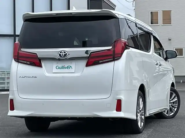 トヨタ アルファード S タイプゴールド 道央・札幌 2021(令3)年 7.2万km ホワイトパールクリスタルシャイン ４WD/純正メーカーナビ/CD/DVD/BT/フルセグ/純正フリップダウンモニター/トヨタセーフティセンス/プリクラッシュセーフティ/横滑り防止装置/レーダークルーズコントロール/レーンキープアシスト/クリアランスソナー/パーキングサポートブレーキ/ロードサインアシスト/バックカメラ/ビルトインETC/ドライブレコーダー/アイドリングストップ/ECOMODE/両側パワースライドドア/パワーバックドア/ハーフレザーシート/2列目オットマン/革巻きウッドコンビステアリング/ステアリングリモコン/電動パーキング/ブレーキホールド/MTモード付AT/プッシュスタート/スマートキー/LEDヘッドライト/オートライト/オートハイビーム/フォグランプ/電動格納ミラー/ウィンカーミラー/純正フロアマット/ドアバイザー/スペアキー
