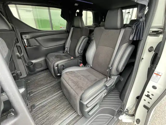 トヨタ アルファード S タイプゴールド 道央・札幌 2021(令3)年 7.2万km ホワイトパールクリスタルシャイン ４WD/純正メーカーナビ/CD/DVD/BT/フルセグ/純正フリップダウンモニター/トヨタセーフティセンス/プリクラッシュセーフティ/横滑り防止装置/レーダークルーズコントロール/レーンキープアシスト/クリアランスソナー/パーキングサポートブレーキ/ロードサインアシスト/バックカメラ/ビルトインETC/ドライブレコーダー/アイドリングストップ/ECOMODE/両側パワースライドドア/パワーバックドア/ハーフレザーシート/2列目オットマン/革巻きウッドコンビステアリング/ステアリングリモコン/電動パーキング/ブレーキホールド/MTモード付AT/プッシュスタート/スマートキー/LEDヘッドライト/オートライト/オートハイビーム/フォグランプ/電動格納ミラー/ウィンカーミラー/純正フロアマット/ドアバイザー/スペアキー