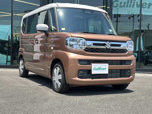 スズキ スペーシア HYBRID X 鹿児島県 2023(令5)年 0.4万km 茶Ⅱ セーフティサポート/社外オーディオ/　　CD/AUX/両側パワースライドドア/LEDオートライト/シートヒーター/純正アルミホイール14インチ/アイドリングストップ/スマートキー