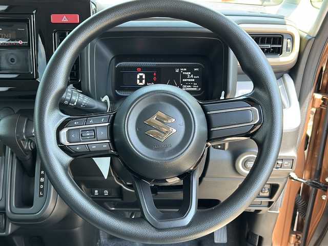 スズキ スペーシア HYBRID X 鹿児島県 2023(令5)年 0.4万km 茶Ⅱ セーフティサポート/社外オーディオ/　　CD/AUX/両側パワースライドドア/LEDオートライト/シートヒーター/純正アルミホイール14インチ/アイドリングストップ/スマートキー