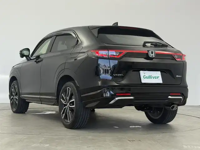 ホンダ ヴェゼル ハイブリッド e:HEV Z 愛知県 2024(令6)年 2.8万km クリスタルブラックパール 純正ナビ/バックモニター/フルセグTV/Bluetooth接続/OPグリル/前席シートヒーター/ハンドルヒーター/ETC 2.0/オートクルーズコントロール/コーナーセンサー/誤発進抑制機能/ブラインドスポットモニター/バックモニター/アダプティブクルーズコントロール/ワイヤレス充電/電動パーキングブレーキ/オートホールド/BSM (ブラインドスポットモニター)/カーテンエアバック/サイドエアバック/パドルシフト/トノカバー