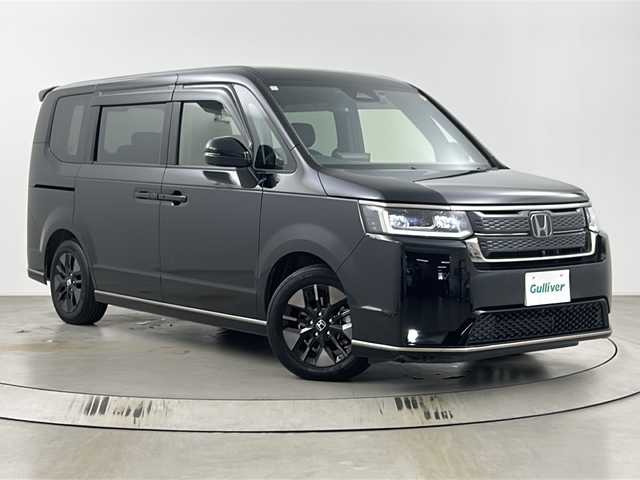 ホンダ ステップワゴン スパーダ 埼玉県 2024(令6)年 1.4万km クリスタルブラックパール 純正11.4インチナビ(LXM-247FLi)/・CD/DVD/Bluetooth/HDMI/フルセグTV/Musicrack/純正15.6インチリアモニター(VM-231FE)/マルチビューカメラ/両側電動スライドドア/ホンダセンシング/・衝突軽減システム/・誤発進抑制機能/・後方誤発進抑制機能/・アダプティブクルーズコントロール/・車線維持視線システム/・先行発進お知らせ機能/・ブラインドスポットインフォメーション/・標識認識機能/・オートハイブーム/前席シートヒーター/シートバックテーブル(運転席/助手席)/2列目キャプテンシート/電動パーキングブレーキ/ブレーキホールド/ステアリングスイッチ/パドルシフト/純正16インチアルミホイール/ETC/アイドリングストップ