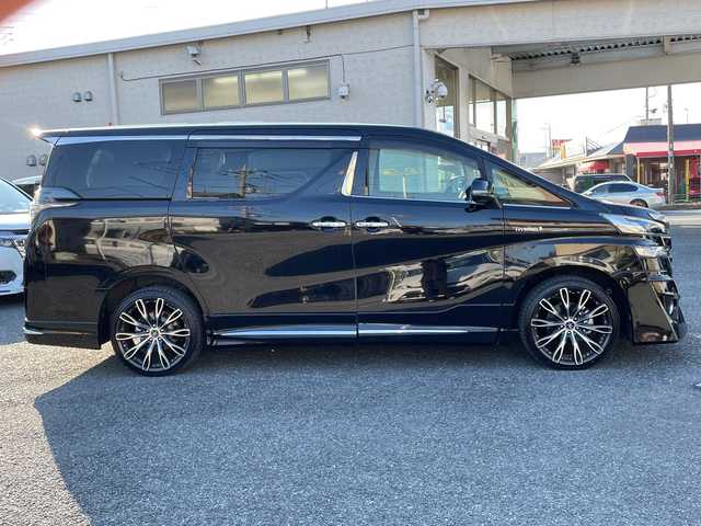 トヨタ ヴェルファイア ハイブリット V 埼玉県 2015(平27)年 13.2万km 黒 ・社外エアロ/・ワーク20インチアルミ/・純正ナビ　BT/TV/・後席モニター/・バック＆フロントカメラ/・ETC/・ドライブレコーダー/・電動パーキング/・両側パワースライドドア/・電動リアゲート/・ブレーキホールド/・ステアリングスイッチ/・レーダークルコン/・衝突軽減ブレーキ/・横滑り防止/・オットマン/・前席パワーシート/・シートメモリー/・純正フロアマット/・ドアバイザー/・ウッドコンビステアリング/・スマートキー×２/・プッシュスタート/・保証書/・取説