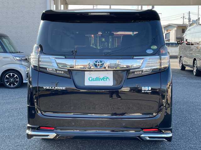 トヨタ ヴェルファイア ハイブリット V 埼玉県 2015(平27)年 13.2万km 黒 ・社外エアロ/・ワーク20インチアルミ/・純正ナビ　BT/TV/・後席モニター/・バック＆フロントカメラ/・ETC/・ドライブレコーダー/・電動パーキング/・両側パワースライドドア/・電動リアゲート/・ブレーキホールド/・ステアリングスイッチ/・レーダークルコン/・衝突軽減ブレーキ/・横滑り防止/・オットマン/・前席パワーシート/・シートメモリー/・純正フロアマット/・ドアバイザー/・ウッドコンビステアリング/・スマートキー×２/・プッシュスタート/・保証書/・取説