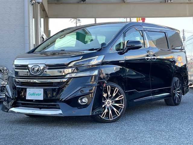 トヨタ ヴェルファイア ハイブリット V 埼玉県 2015(平27)年 13.2万km 黒 ・社外エアロ/・ワーク20インチアルミ/・純正ナビ　BT/TV/・後席モニター/・バック＆フロントカメラ/・ETC/・ドライブレコーダー/・電動パーキング/・両側パワースライドドア/・電動リアゲート/・ブレーキホールド/・ステアリングスイッチ/・レーダークルコン/・衝突軽減ブレーキ/・横滑り防止/・オットマン/・前席パワーシート/・シートメモリー/・純正フロアマット/・ドアバイザー/・ウッドコンビステアリング/・スマートキー×２/・プッシュスタート/・保証書/・取説